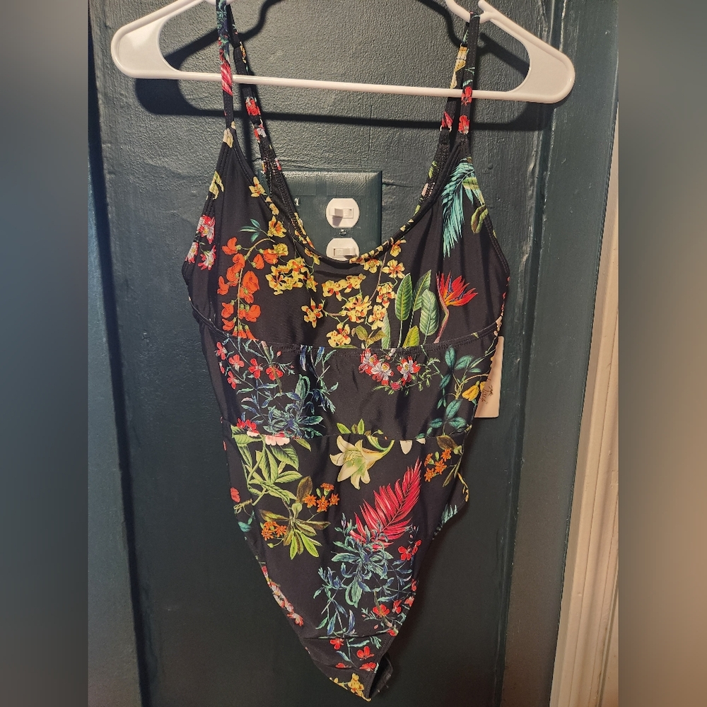 NWT beach joy one piece bathing suit. Size large and multi colored